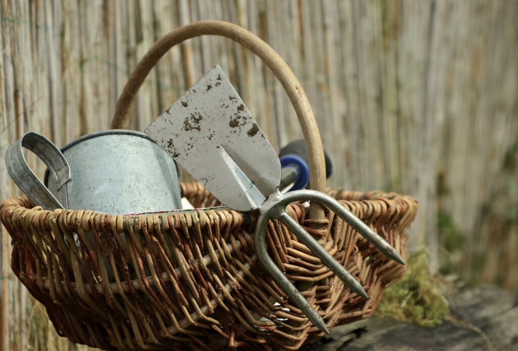 gardening tool in a basket, getting your garden ready for spring